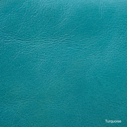 Close-up of Turquoise leather showing its color, grain, and texture.